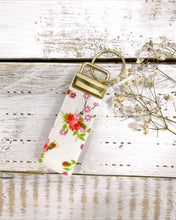 Load image into Gallery viewer, Red flower handmade key fob chain with matching hair scrunchie perfect for a gift.