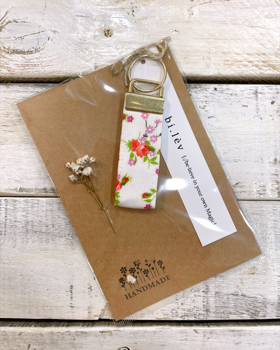 Red flower handmade key fob chain with matching hair scrunchie perfect for a gift.