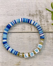 Load image into Gallery viewer, LOVE pearl polymer clay bracelet
